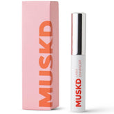 MUSKD Eyelash Growth Serum bottle close-up showing nourishing formula for fuller lashes.