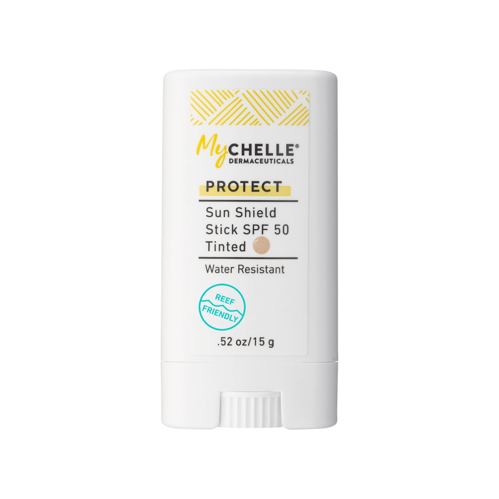 MyCHELLE Sun Shield Stick SPF 50 tinted on skin for natural UV protection and glow