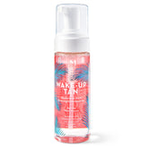 Mystic Tan Wake-Up Tan water mousse bottle shows clear formula for transfer-free tanning.