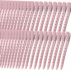Mythos pink duck-billed clip closeup showing secure grip for all hair types