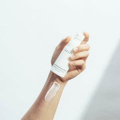 NAELI Face Moisturizer SPF30 application shows quick absorption for smooth, non-greasy skin.