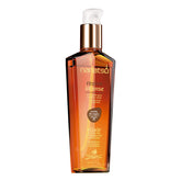 Naissant Elixir Argan Oil Hair Treatment bottle close-up showing premium packaging and nourishment.
