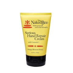 The Naked Bee orange blossom honey hand cream tube ready for use, delivering rich moisture.
