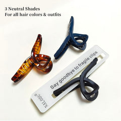 Nalodu hair claw clip large 4-inch butterfly navy blue complements denim and cool-toned looks.