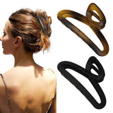 Nalodu large hair claw clip 4.3-inch showing secure hold for thick, long hair.