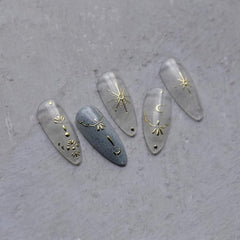 Namrec 3D nail stickers moon star detail showing dimensional gold design.