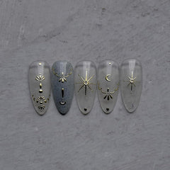 Namrec moon star nail stickers applied on nails show easy DIY application.