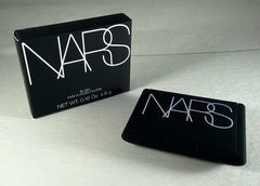 NARS Orgasm close-up highlights golden shimmer particles that catch light beautifully.