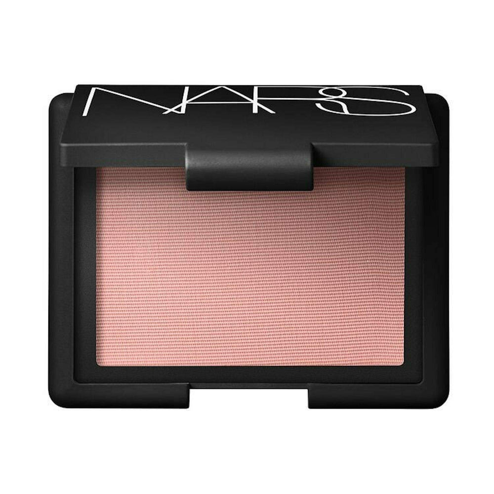 NARS Orgasm blush compact open offers silky texture for a radiant, natural glow.