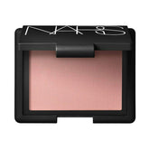 NARS Orgasm blush compact open offers silky texture for a radiant, natural glow.
