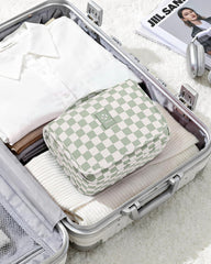 Narwey small hanging toiletry bag mint green checkered interior with bottle straps keeps toiletries upright.
