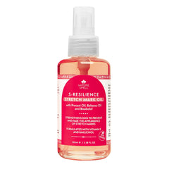 Nature Spell stretch mark oil bottle closeup shows premium formula for smoother skin