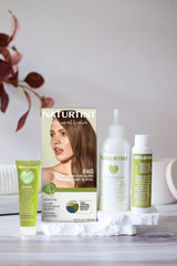Naturtint 6WG dye being applied on hair with foil for even coverage.