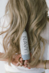 NAVY Hair Care Dry Texture Spray adds bun volume from the shaft for updo support.