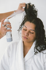 NAVY Hair Care Dry Texture Spray texture visible in styled hair with movement.