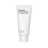 Nécessaire The Body Exfoliator bottle demonstrating gentle exfoliation for smoother skin.
