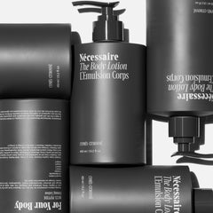 Nécessaire The Body Lotion Plant Oils visual with droplets suggests vitamin-rich nourishment.