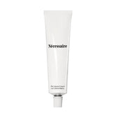 Nécessaire Hand Cream application close-up showing smooth texture and quick absorption.
