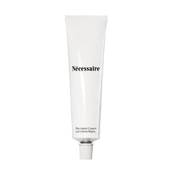 Nécessaire Hand Cream application close-up showing smooth texture and quick absorption.