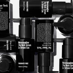 Nécessaire The Neck Serum drops on neck illustrate fast-absorbing texture.