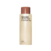 Nécessaire Olibanum body wash bottle for daily fragrance-free cleansing