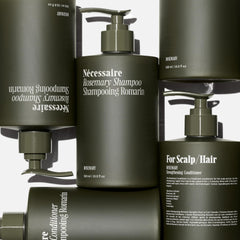 Nécessaire Rosemary Conditioner bottle conveys detangling benefits for soft, manageable hair.