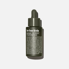 Nécessaire Rosemary Serum being applied to scalp for quick-dry, no-residue results.