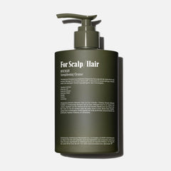 Nécessaire Rosemary Shampoo ingredients-rosemary close-up highlights pure rosemary for gentle cleansing.