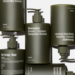 Nécessaire Rosemary Shampoo lather-closeup shows rich foam for everyday cleansing.