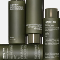 Nécessaire Rosemary Shampoo lather closeup – gel-cream texture.