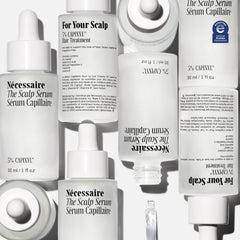 Nécessaire Scalp Serum on hair close-up showing hydration