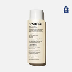 Nécessaire The Shampoo hair-lather demonstrates fragrance-free cleansing.