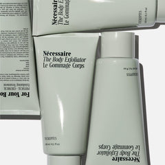 Nécessaire The Body Exfoliator volcanic pumice resurfaces rough patches