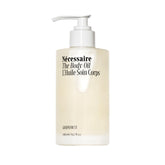 Nécessaire The Body Oil bottle closeup for easy daily moisturization.
