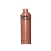 Nécessaire The Body Vitamin C Serum bottle with pump for easy daily use.