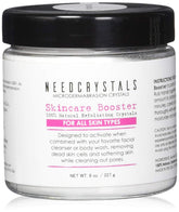 NeedCrystals microdermabrasion crystals in a jar close-up for spa-grade exfoliation