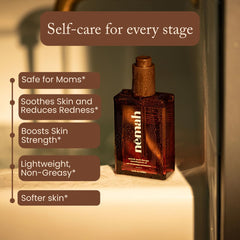 Nemah Nourishing Belly Oil being massaged onto a growing belly for dry skin relief.