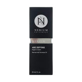 Nerium Night Cream bottle closeup showcasing peptide-rich formula for overnight hydration.