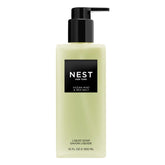 NEST New York Ocean Mist bottle pour, refreshing cleanse at sink.