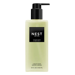 NEST New York Ocean Mist bottle pour, refreshing cleanse at sink.