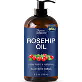 Nexon Botanics Rosehip Oil bottle on counter provides deep hydration for daily facial care.