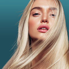 Nexxus Ultralight Smooth Conditioner bottle emphasizes conditioning boost without weighing hair down.