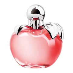 Nina Ricci Nina fragrance apple-shaped bottle with gold leaf cap evokes a fairy-tale moment.
