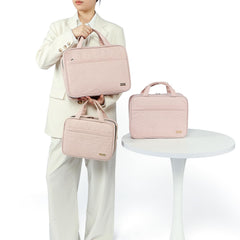 NISHEL pink travel toiletry bag holds full-sized shampoo and conditioner without crowding.