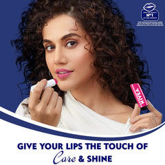 NIVEA Fruity Shine Watermelon Lip Balm texture close-up, creamy and smooth.