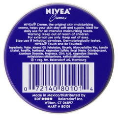 NIVEA Skin Creme tin being applied to hands for daily nourishment.