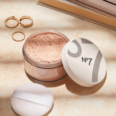 No7 Flawless Finish Loose Powder fair shade swatch on skin.