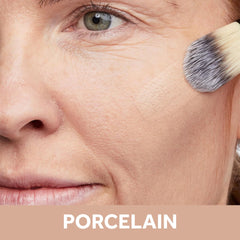 No7 Restore & Renew porcelain swirl demonstrates buildable coverage for natural-looking skin