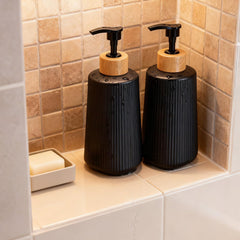 Nortsa Miira striped matte black glass dispenser highlighting modern farmhouse style
