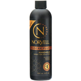 Norvell Tuscan Plus bottle front shows premium sunless tanning formula for natural color